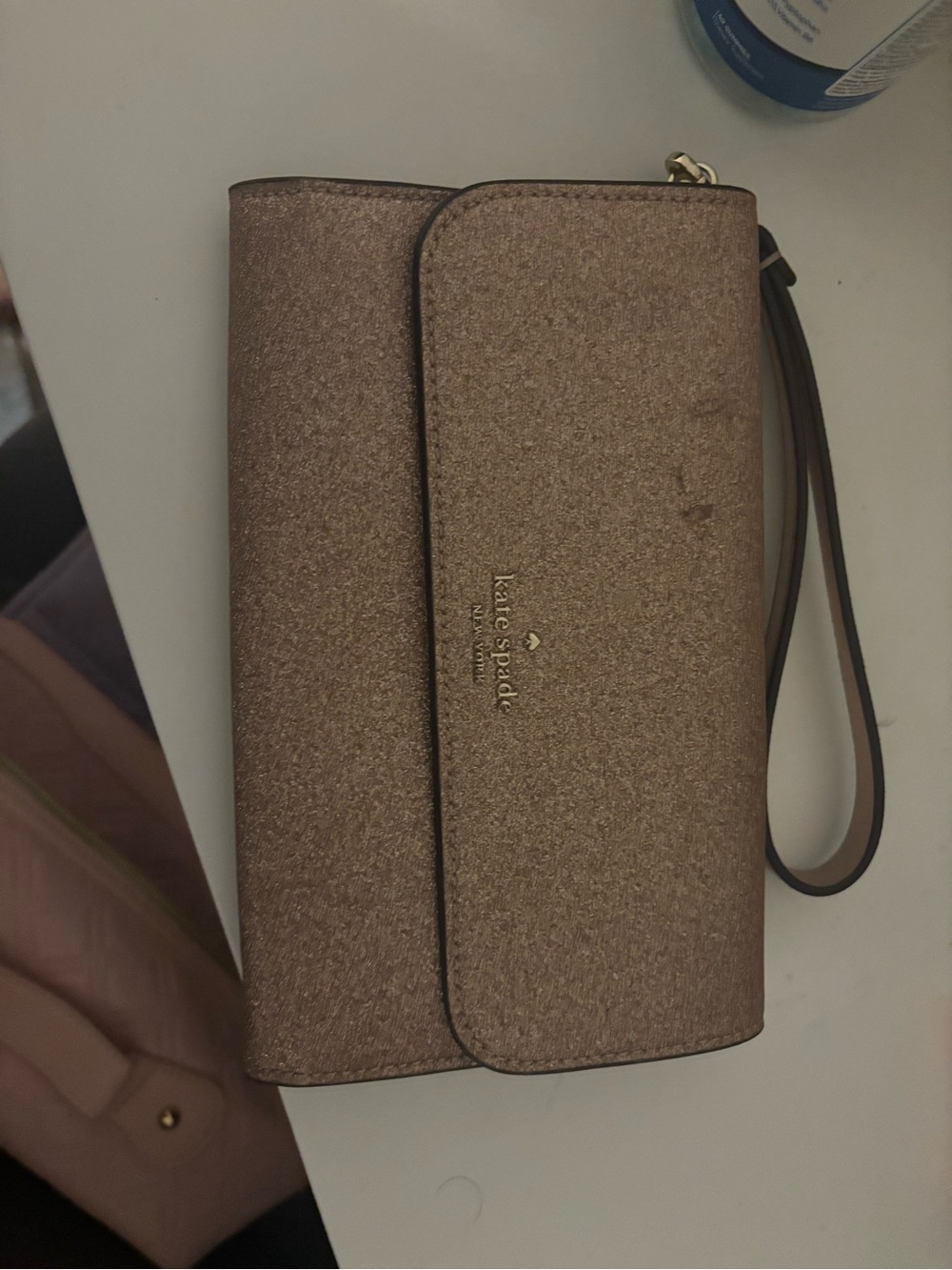 kate spade glitter wristlet in rose bronze